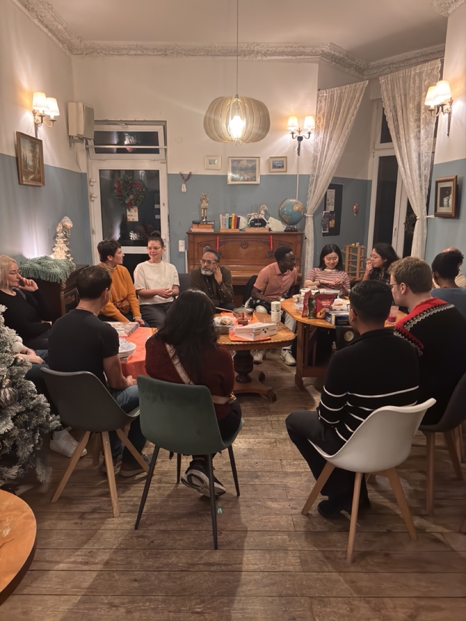 Inner Circle dinner, members sharing a potluck meal